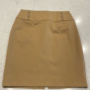 Stylish camel color pencil skirt in size 4.